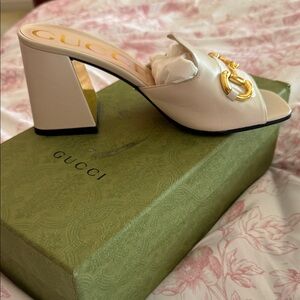 Gucci Women's Off-White Leather Mules with Gold Accent